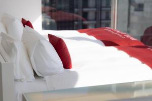 Ένα ή περισσότερα κρεβάτια σε δωμάτιο στο CUVEE J2 HOTEL OSAKA by Onko Chishin