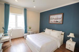 Postel nebo postele na pokoji v ubytování Hotel Du Lys
