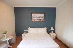Postel nebo postele na pokoji v ubytování Hotel Du Lys