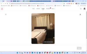 a screenshot of a bedroom with a bed and a desk at Main floor room 4, 22 minute from airport in Edmonton