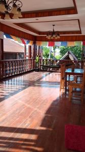 Balkón nebo terasa v ubytování Tibet Restaurant and Hostel