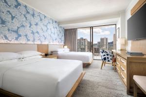 Postel nebo postele na pokoji v ubytování Sheraton Princess Kaiulani Waikiki Beach