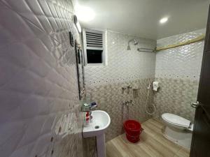 A bathroom at Heart of Rajshahi Hub-Appt C