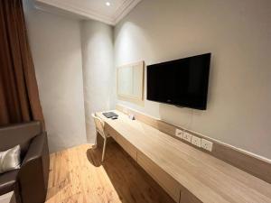 TV a/nebo společenská místnost v ubytování Sky Hotel Chow Kit PWTC