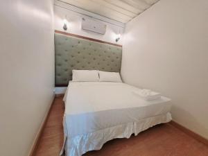 Postel nebo postele na pokoji v ubytování Marc Hotel Maesai