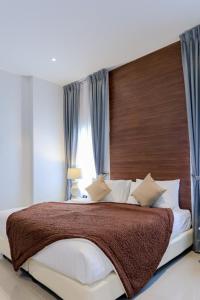 Postel nebo postele na pokoji v ubytování Marc Hotel Maesai