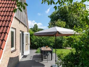 Κήπος έξω από το Holiday Home in Meeussen with Private Garden