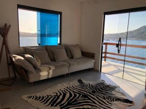 Galería fotográfica de Casa a beira-mar en Arraial do Cabo