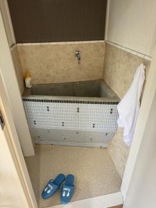 Un baño de Self check-in Hostel 5mins from JR Nishi Hiro station