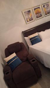 Postel nebo postele na pokoji v ubytování Mandeville Hideaway