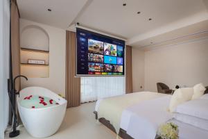 THAT MAY Hotel客房内的一张或多张床位
