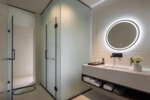 Koupelna v ubytování THAT MAY Hotel + 37 fotografií