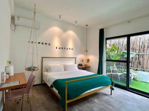 Postel nebo postele na pokoji v ubytování Xiamen Mingshu Shanqiu Homestay