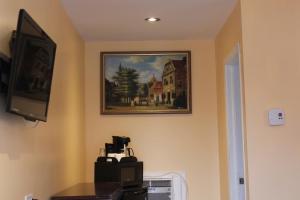 TV a/nebo společenská místnost v ubytování Imperial Inn Thousand Islands