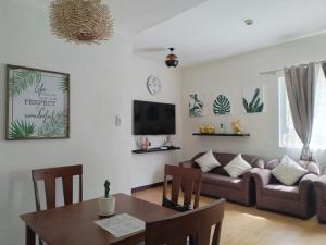 TV a/nebo společenská místnost v ubytování Mesaverte Residences Condominium