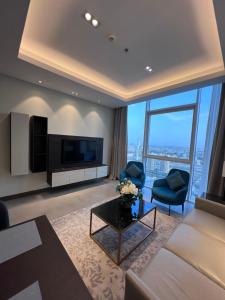 Cozy Stay tesisinde bir televizyon ve/veya eğlence merkezi