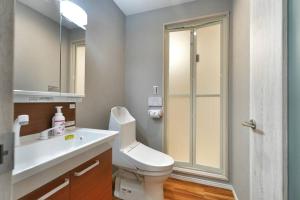 a bathroom with a toilet and a sink and a shower at ZJ301 Hanama301 The Skytree Residence A Newly Home by Tokyo Iconic Landmarks in Tokyo +45 photos