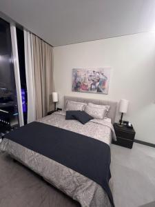 Cozy Stay tesisinde bir odada yatak veya yataklar