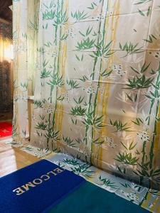 a curtain with a floral pattern on it at H.B Rocket paradise in Srinagar