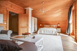 Posteľ alebo postele v izbe v ubytovaní Gemütliches Holzhaus in Gamlitz