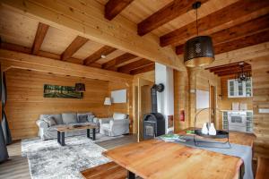 Posedenie v ubytovaní Gemütliches Holzhaus in Gamlitz
