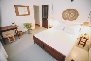 Postel nebo postele na pokoji v ubytování Island Diaries Hostel