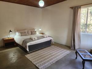 Postel nebo postele na pokoji v ubytování Country Cottage