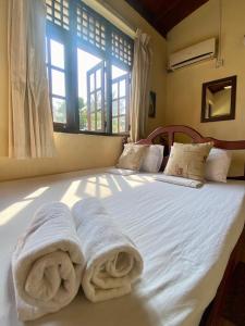 Postel nebo postele na pokoji v ubytování Noahs Ark Transit Stay + 36 fotografií