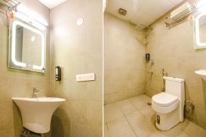 Bilik mandi di Fabhotel Old Meple Leaf- Golf Course Road & Sector 27