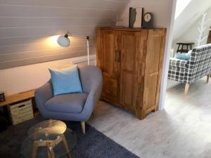 Posezení v ubytování Ferienhaus an der Buche "Sternenblick" + 9 fotografií