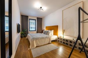 Katil atau katil-katil dalam bilik di Apartment Invalidovna with FREE parking
