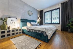 Katil atau katil-katil dalam bilik di Apartment Invalidovna with FREE parking