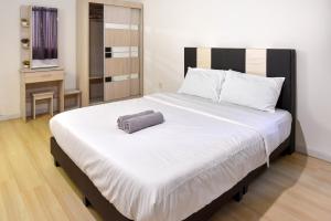 Postel nebo postele na pokoji v ubytování Taiping Lake Garden 3BR Homestay with WiFi & Netflix + 40 fotografií
