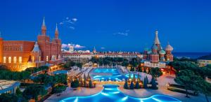 an aerial view of a resort at night at Kremlin Palace in Lara