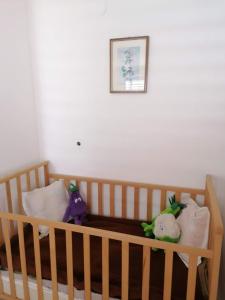 Postel nebo postele na pokoji v ubytování Apartments Olgi