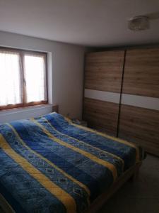 Postel nebo postele na pokoji v ubytování Apartments Olgi