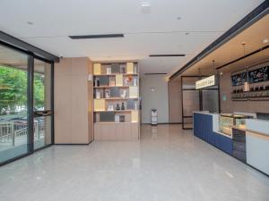 A cozinha ou kitchenette de Echarm Hotel Qingyuan Qingcheng Station Municipal Government Shop