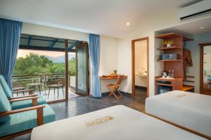 Postel nebo postele na pokoji v ubytování Komsan Kampot Resort