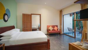 Postel nebo postele na pokoji v ubytování Komsan Kampot Resort
