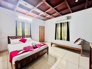 Mundro Garden Homestay客房内的一张或多张床位
