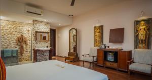 Postel nebo postele na pokoji v ubytování Komsan Kampot Resort