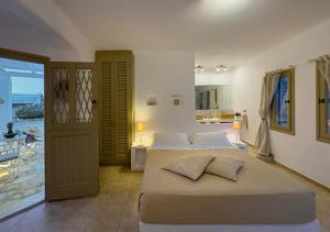 Letto o letti in una camera di Lithia Villas