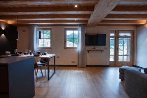 Μια τηλεόραση ή/και κέντρο ψυχαγωγίας στο Snow Villa Genf Spa - Relax