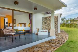 Posezení v ubytování Komsan Kampot Resort