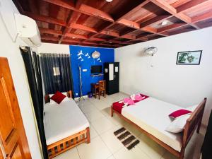 Mundro Garden Homestay客房内的一张或多张床位
