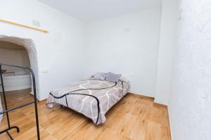 A bed or beds in a room at Casas Rurales Sagasta