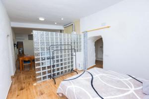 A bed or beds in a room at Casas Rurales Sagasta