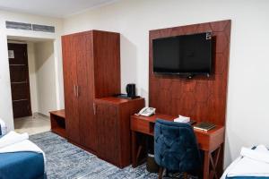 Μια τηλεόραση ή/και κέντρο ψυχαγωγίας στο ديار المروة +19 φωτογραφίες