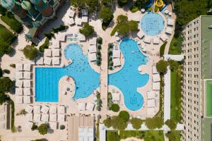 an aerial view of a resort with a swimming pool at Kremlin Palace in Lara