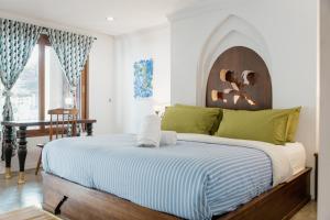 Ein Bett oder Betten in einem Zimmer der Unterkunft The Yard Hostel Chiang Mai